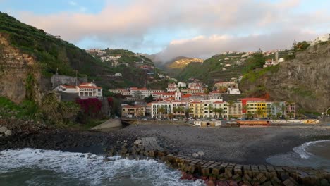 zoomed-out view of the serene town of ponto do sol by the sea, madeira