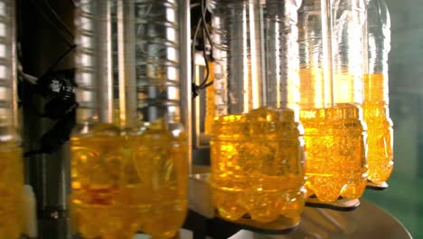 automated bottle filling machine in action
