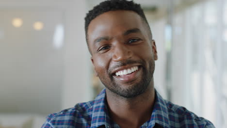 portrait-happy-african-american-businessman-smiling-enjoying-successful-career-proud-entrepreneur-in-office-workplace-testimonial-4k-footage