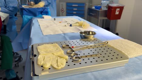 an operating table set up for ophthalmological surgery, equipped with surgical instruments