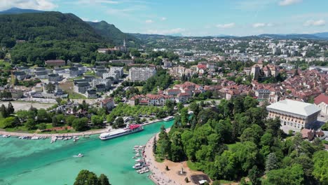 annecy lake and old town panorama city landscape in french alps - aerial