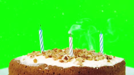 Animation-of-confetti-falling-over-candles-on-birthday-cake-on-green-screen
