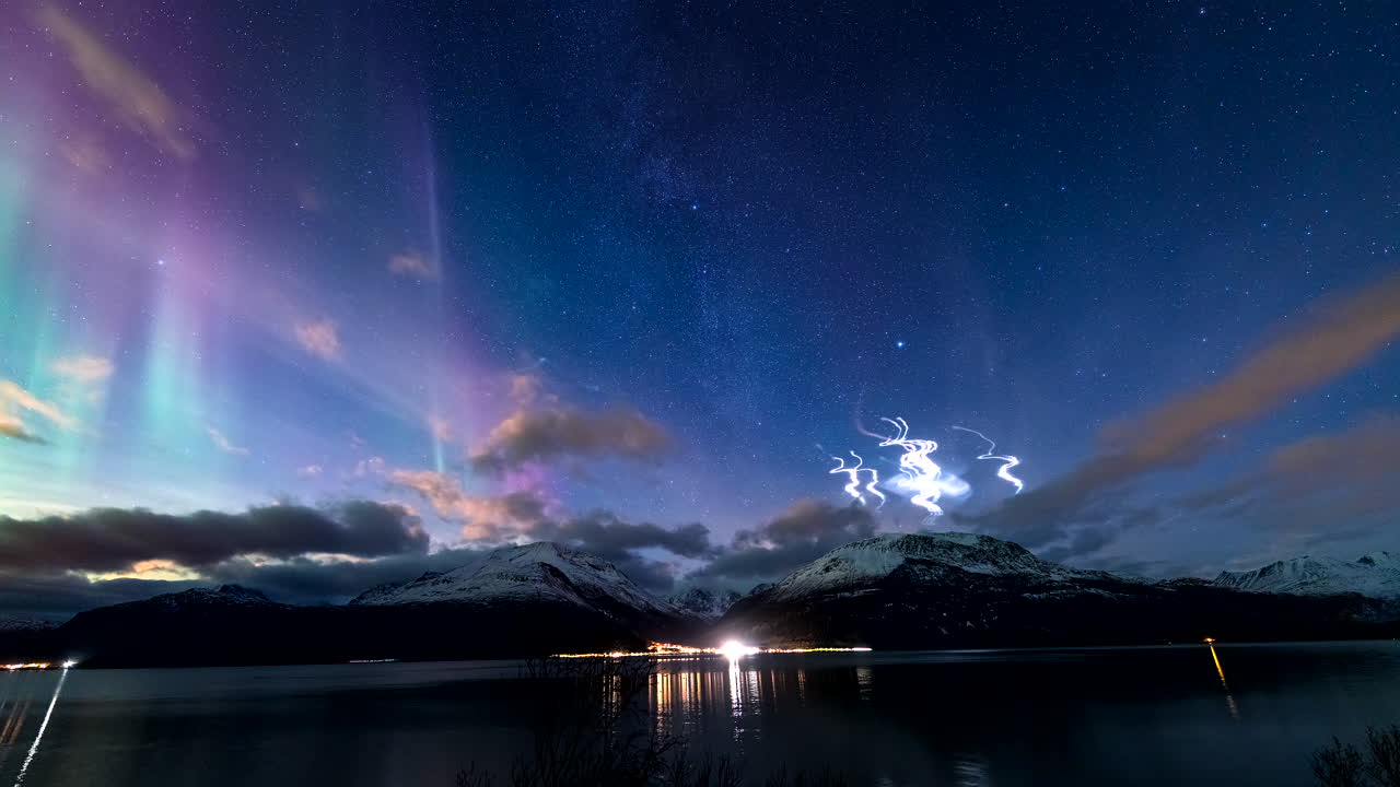 Aurora borealis in sky during Andoya Space test rockets launch, time-lapse