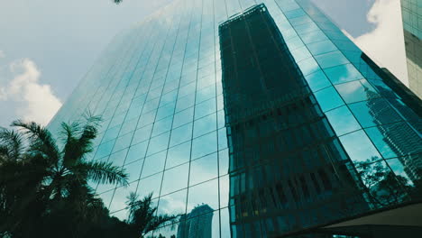modern skyscraper reflection in glass facade
