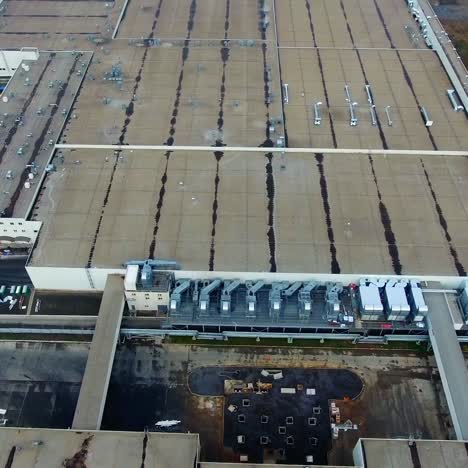 modern manufacture in the countryside. newly built factory from above. big industrial zone
