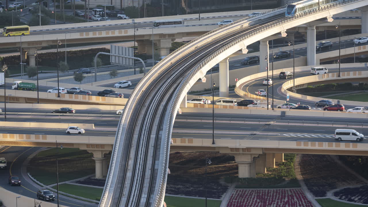Metro Train and Busy Highway Traffic in Modern City Interchange