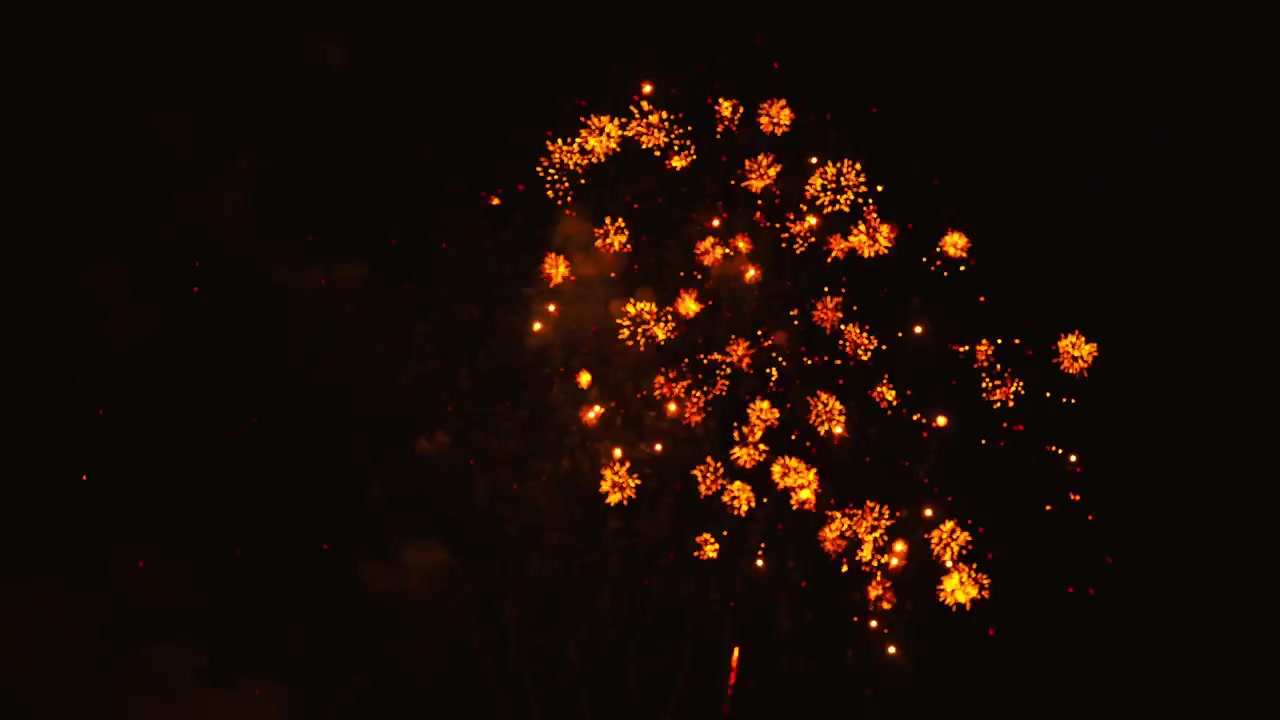 璀璨橙色煙花在夜空中綻放