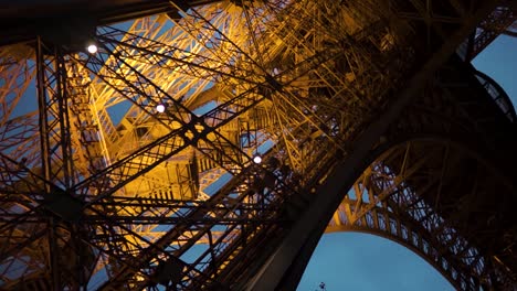 showing the eiffel towers legs.  amazing steelwork.