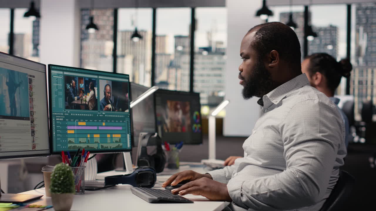 African american filmmaker editing video footage for content production