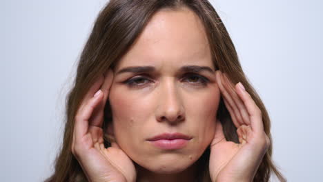 Exhausted-woman-having-headache.-Portrait-of-tired-woman