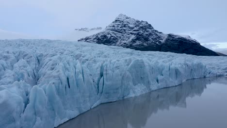 ascending drone shot of fjallsárjökull glacier and vatnajökull glacier in iceland