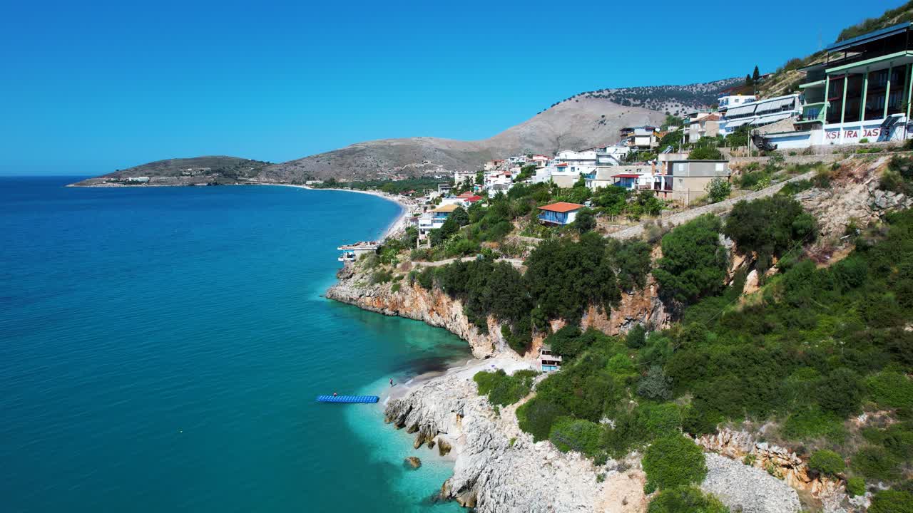 Ionian Coastline of Albania with Rocky Hills and Hidden Turquoise Blue Sea Bay, Mediterranean Villages