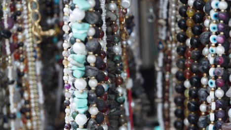 variety of beaded necklaces on display