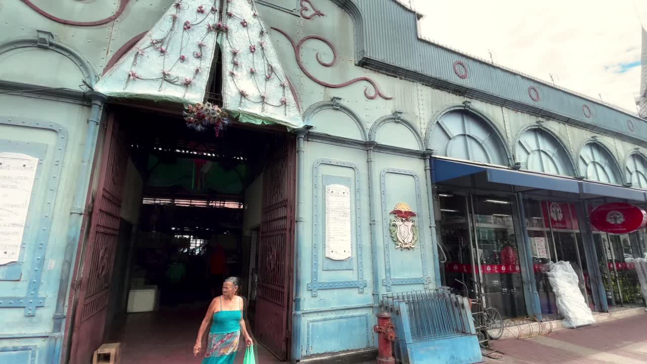 Brazil, Belem, The Ver-o-Peso Market and Surroundings:A panoramic front view of the Ver-o-Peso market, capturing its facade, vibrant activity, and the bustling atmosphere of this iconic marketplace.