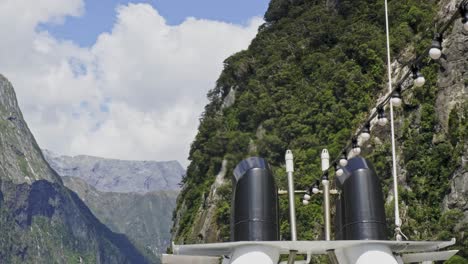 Scenic-Mountains-With-Clouds-In-Blue-Sky-From-A-Cruise-At-Milford-Sound,-Fiordland,-New-Zealand