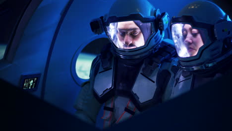 astronautas en la cabina de una nave espacial