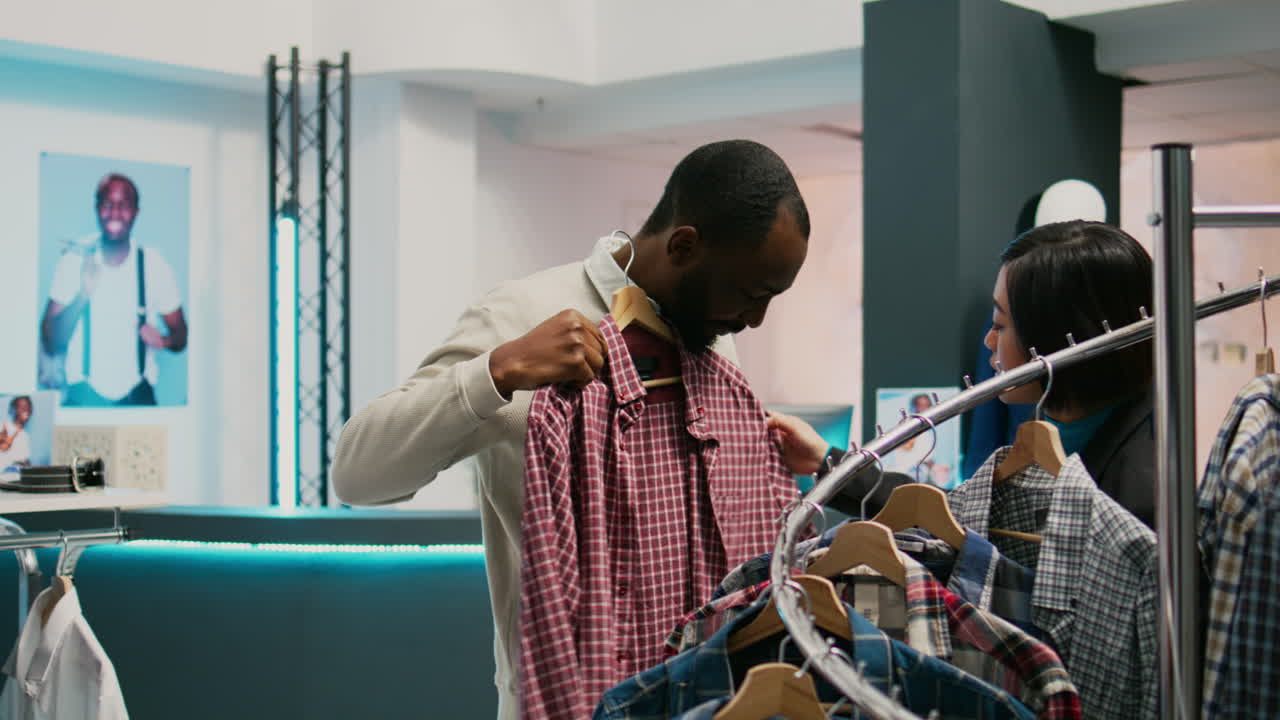 People shopping for clothes in a store