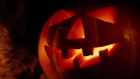 scary old jack-o-lantern on black background.