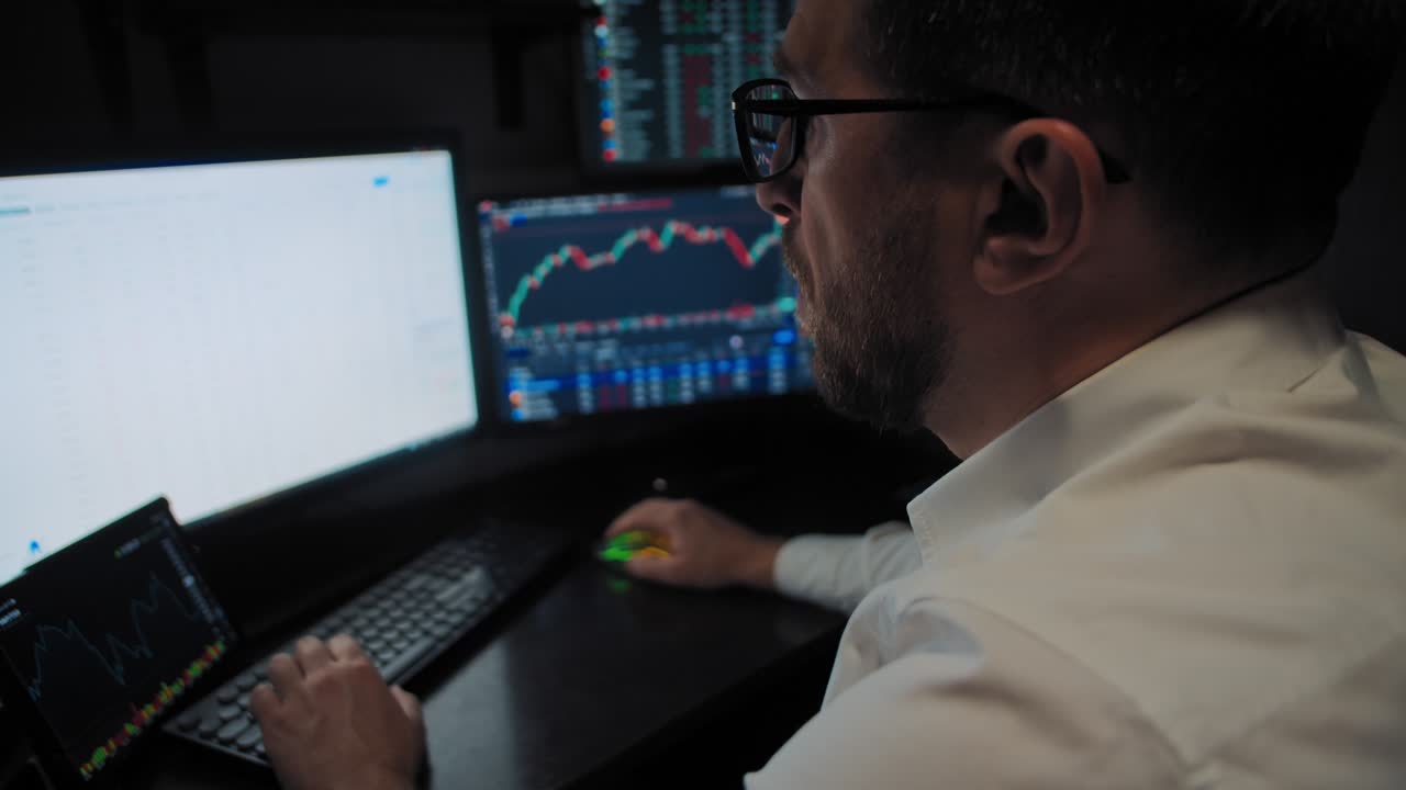 Trader works with stock market data time-lapse