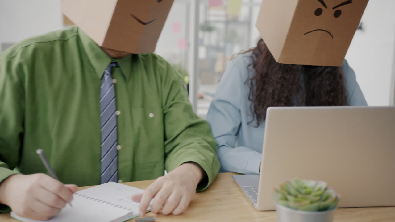 People with Boxes on their Heads
