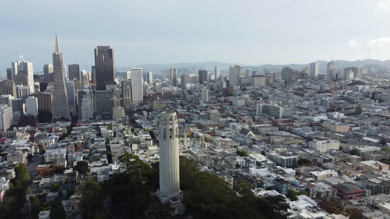 Spectacular 360 Aerial Views Of San Francisco's Famous Skyline And Urban Landscape. Drone Circling Behind Coit Tower On Telegraph Hill.