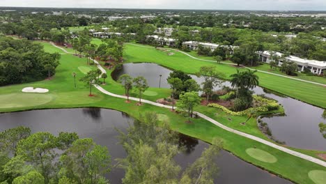 Florida-country-club-golf-course.-Aerial-establishing-shot