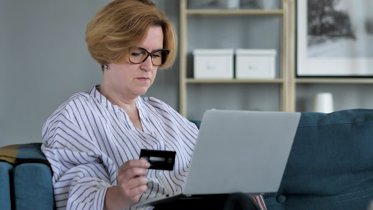 Online Shopping with Credit Card on Laptop