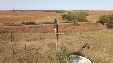 Windmill-on-farm-circling-4K-Drone