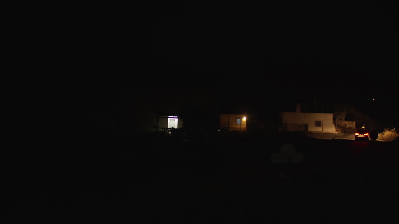 Car on the night road