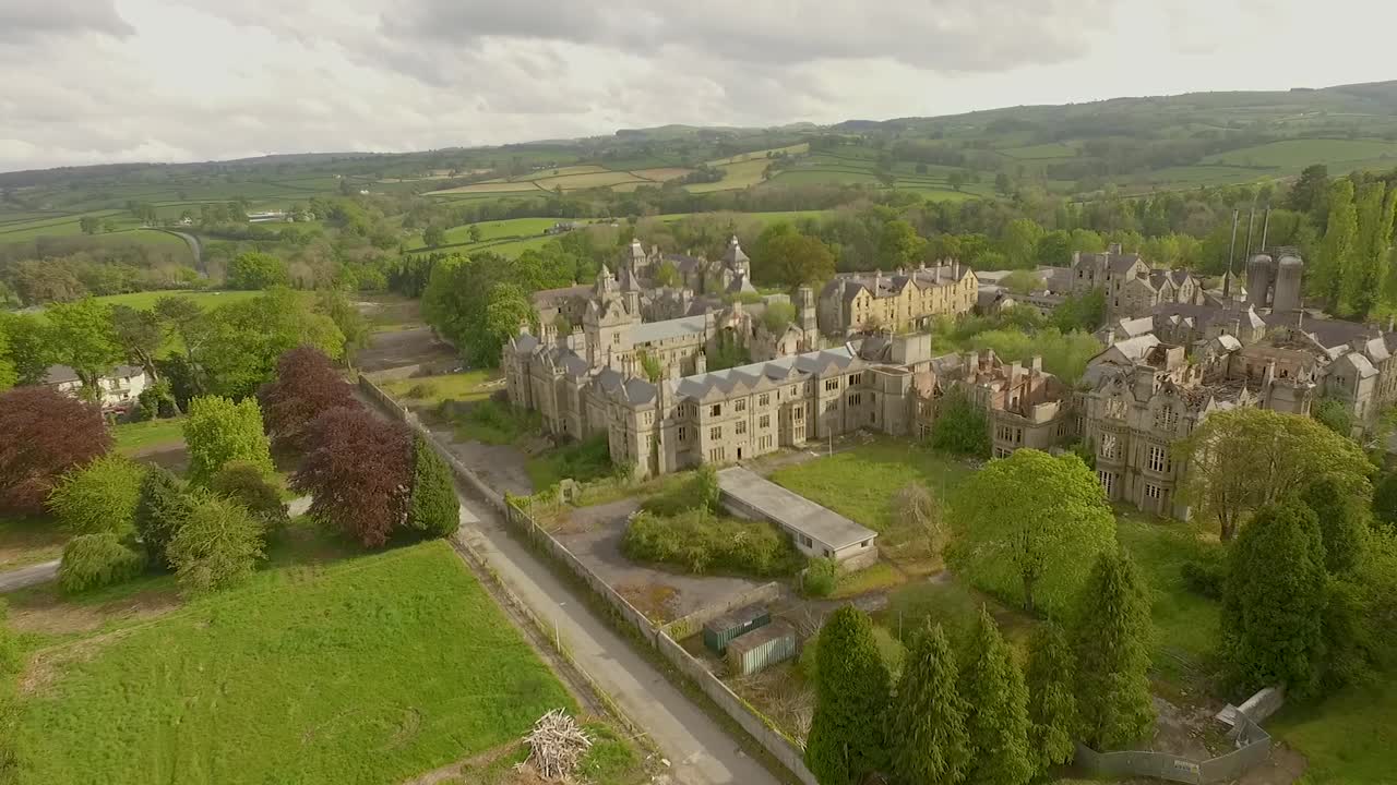 flyover view of the old Denbigh asylum, locally known as Denbigh mental institution. showing extent of fire damage and years of dilapidation.