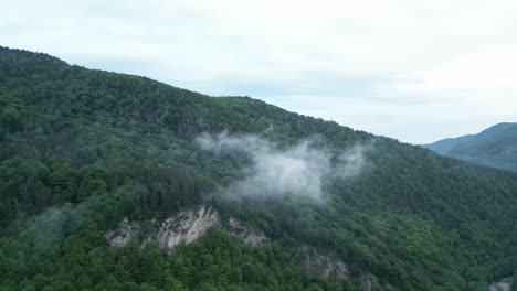 Wooded-Mountainscape-And-Clouds-Over-Hike-Trails-Near-Lepsa,-Vrancea-County,-Romania