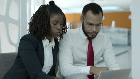 young business people using laptop