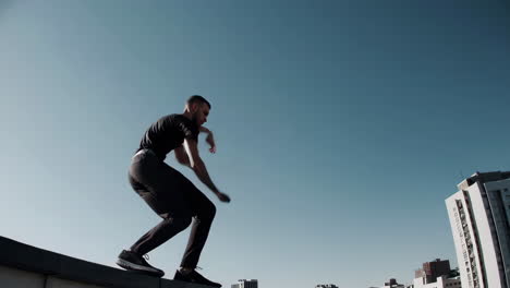 man performing parkour in an urban setting