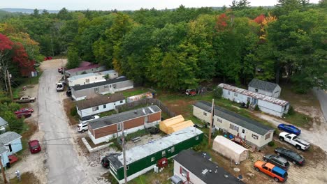 aerial shot over trailer park in the northeast during fall