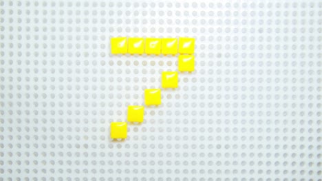 stop motion of the letter z creating one pixel at the time, made with children toys