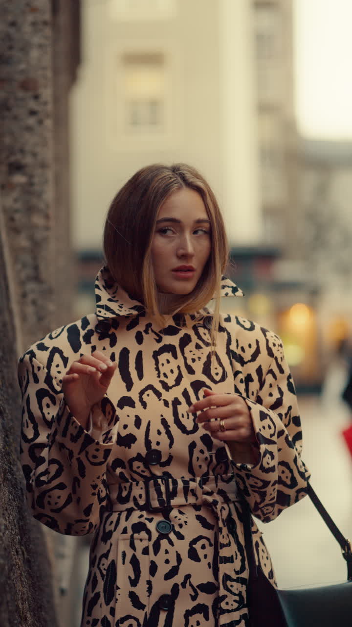 Stylish woman in a leopard print coat