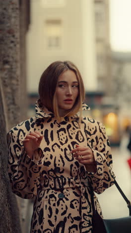stylish woman in a leopard print coat