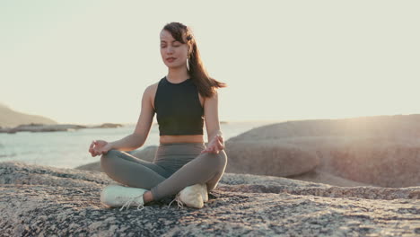 Meditation,-peace-and-yoga-with-woman-at-beach