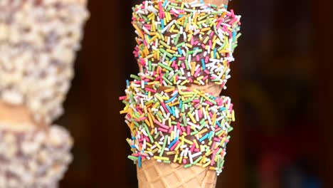 stacked ice cream cones with sprinkles