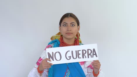 cinematic clip of a young brunette latin girl wearing the traditional outfit named cayambeñas showing up a message saying "no guerra