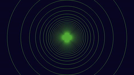 luz verde brillante en medio de un patrón concéntrico circular