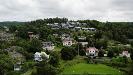 luxurious hillside large villas in ljungskile bohuslan sweden, aerial establishing shot