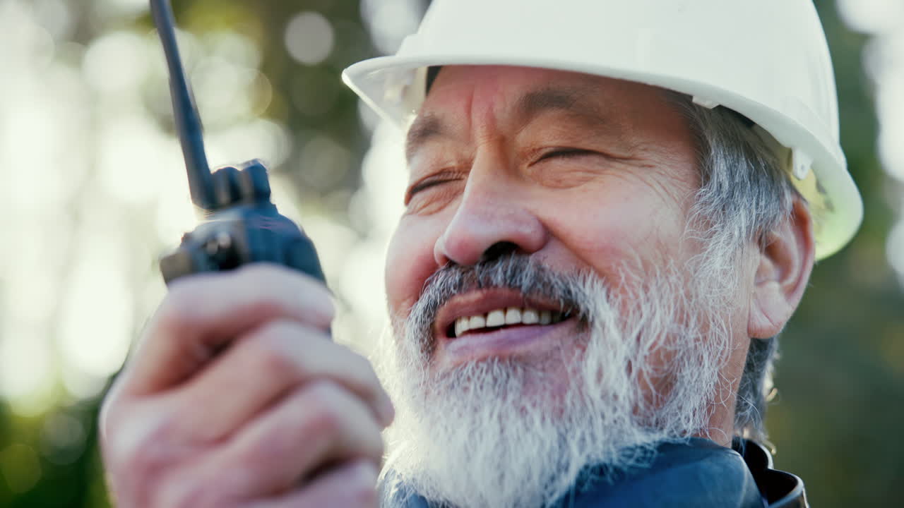 Construction worker with walkie talkie