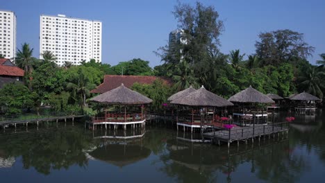 restaurant ơn văn thánh lake with private thatched huts and marina