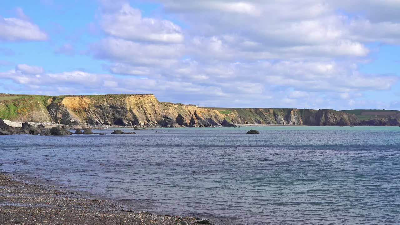 Ireland Epic Locations calm seas at Boatstrand Copper Coast Waterford on a sunny spring morning