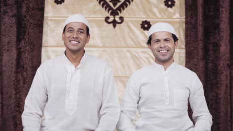 indian muslim men smiling to the camera