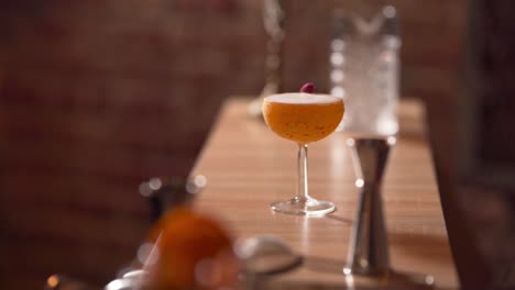 sliding shot of a cocktail prepared by a professional bartender