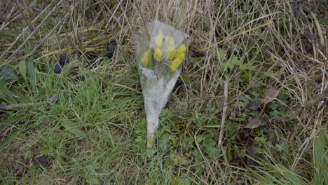 yellow flowers laid down to remember a loved one