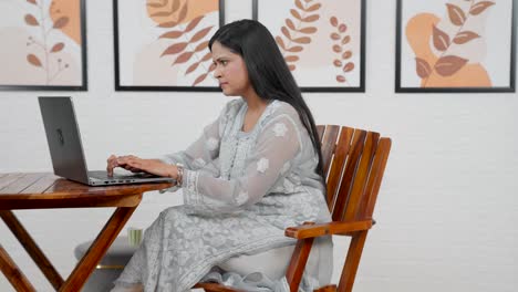 indian woman relaxing at work