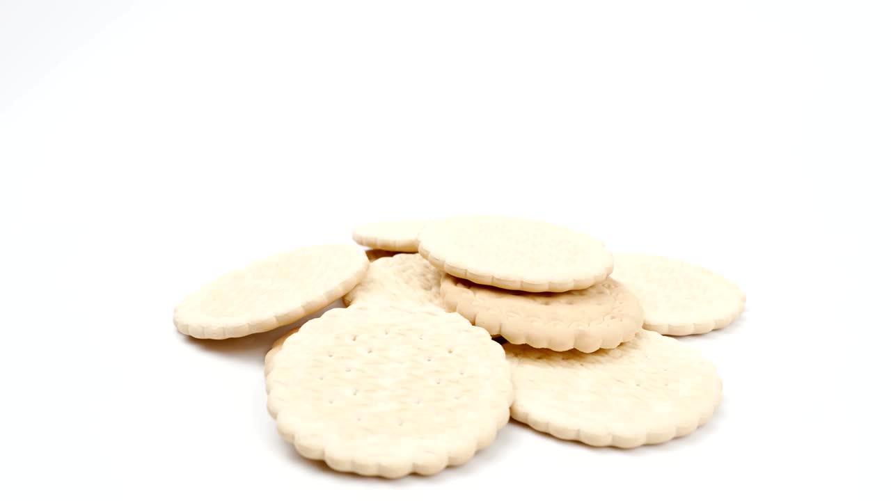 Round cookies on a white background closeup. Rotation.